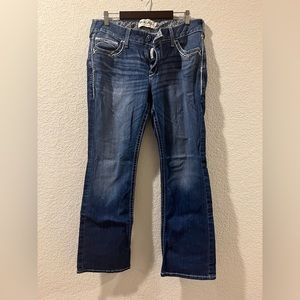 R.E.A.L. Mid Rise Stretch Entwined Boot Cut Jean